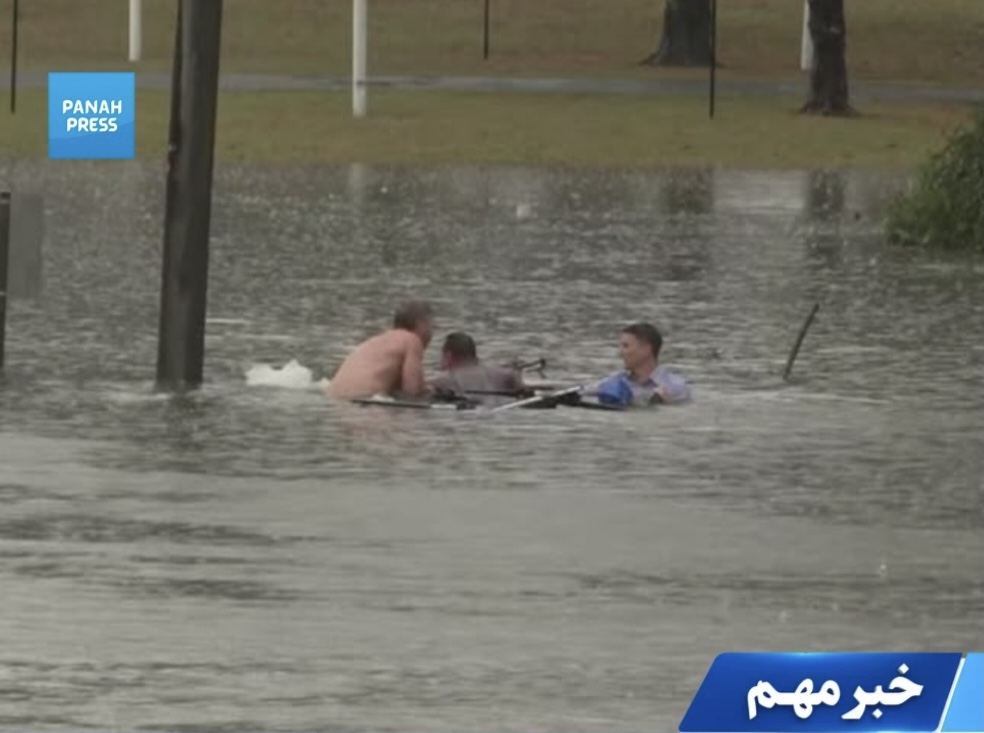 Australian Journalist Rescues Driver from Sinking Car in Floodwaters